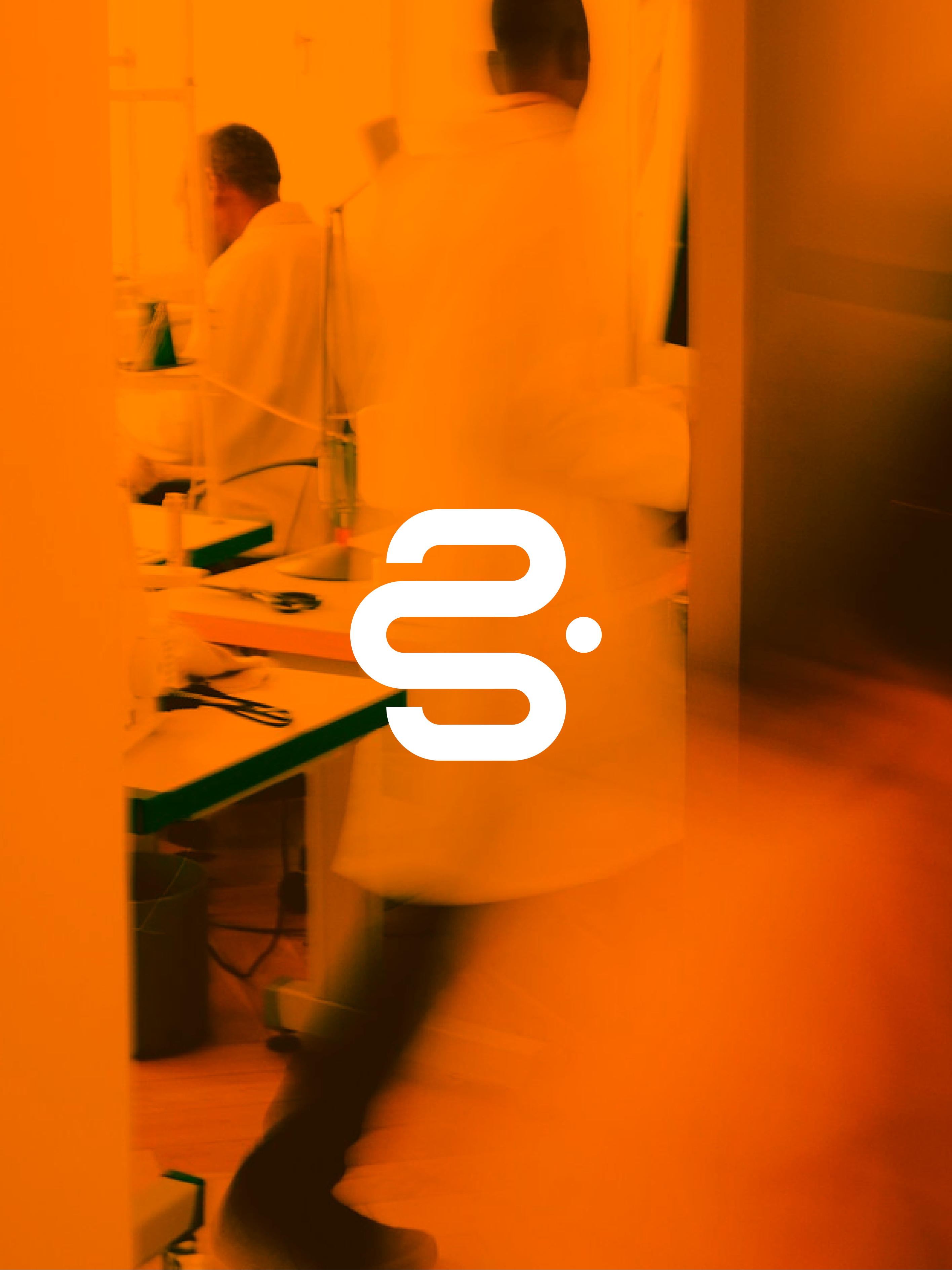 Scientist working in the lab, bathed in Slingshot orange