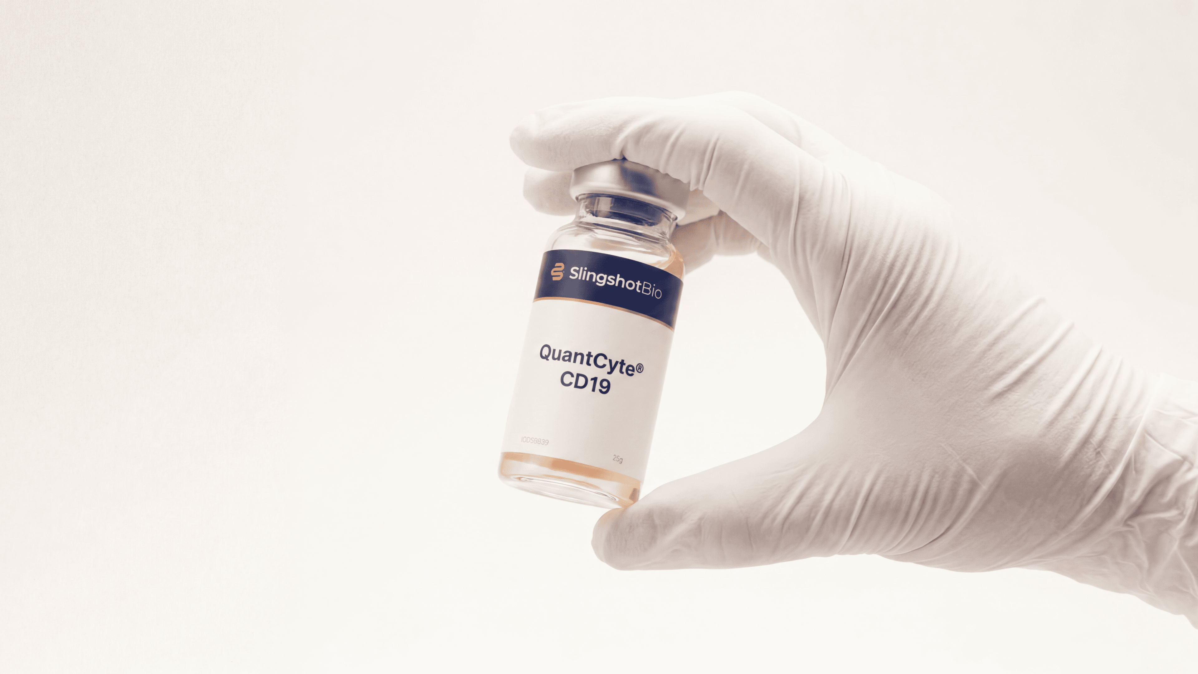 Gloved hand holding a Slingshot Bio vial